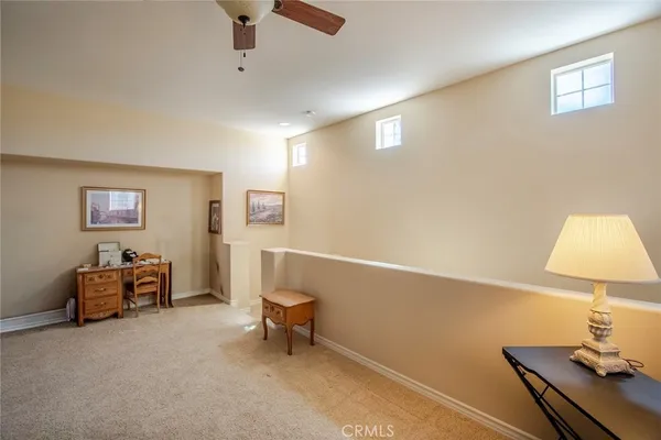a bathroom with a shower sink vanity and mirror