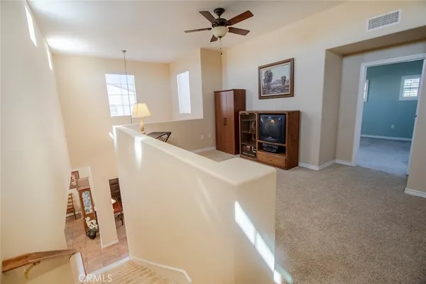 an aerial view of a house with a lake view
