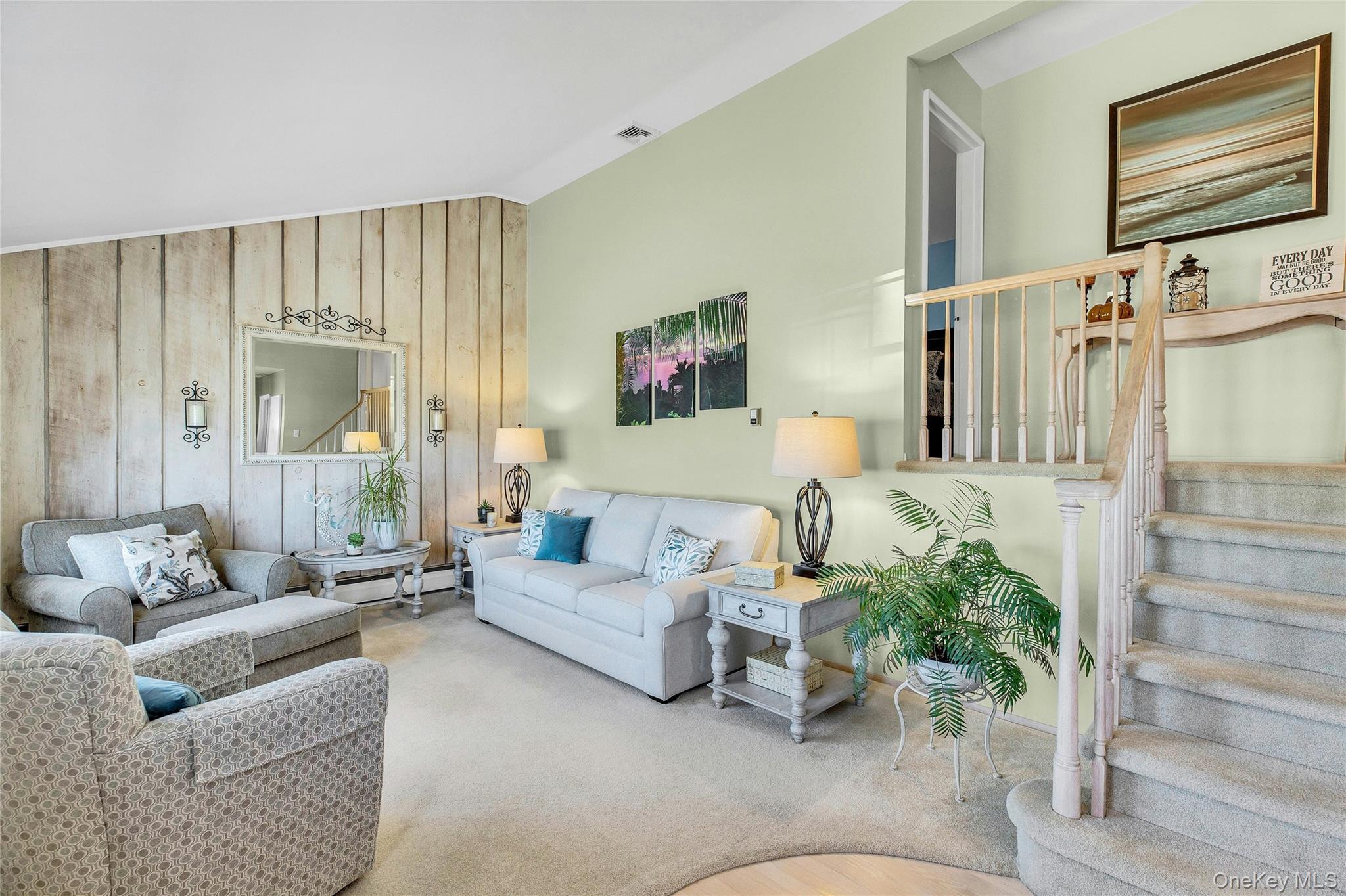 114 Lowell Road Sayville, NY 11782 - Photo 4 of 20 a living room with furniture and a large window