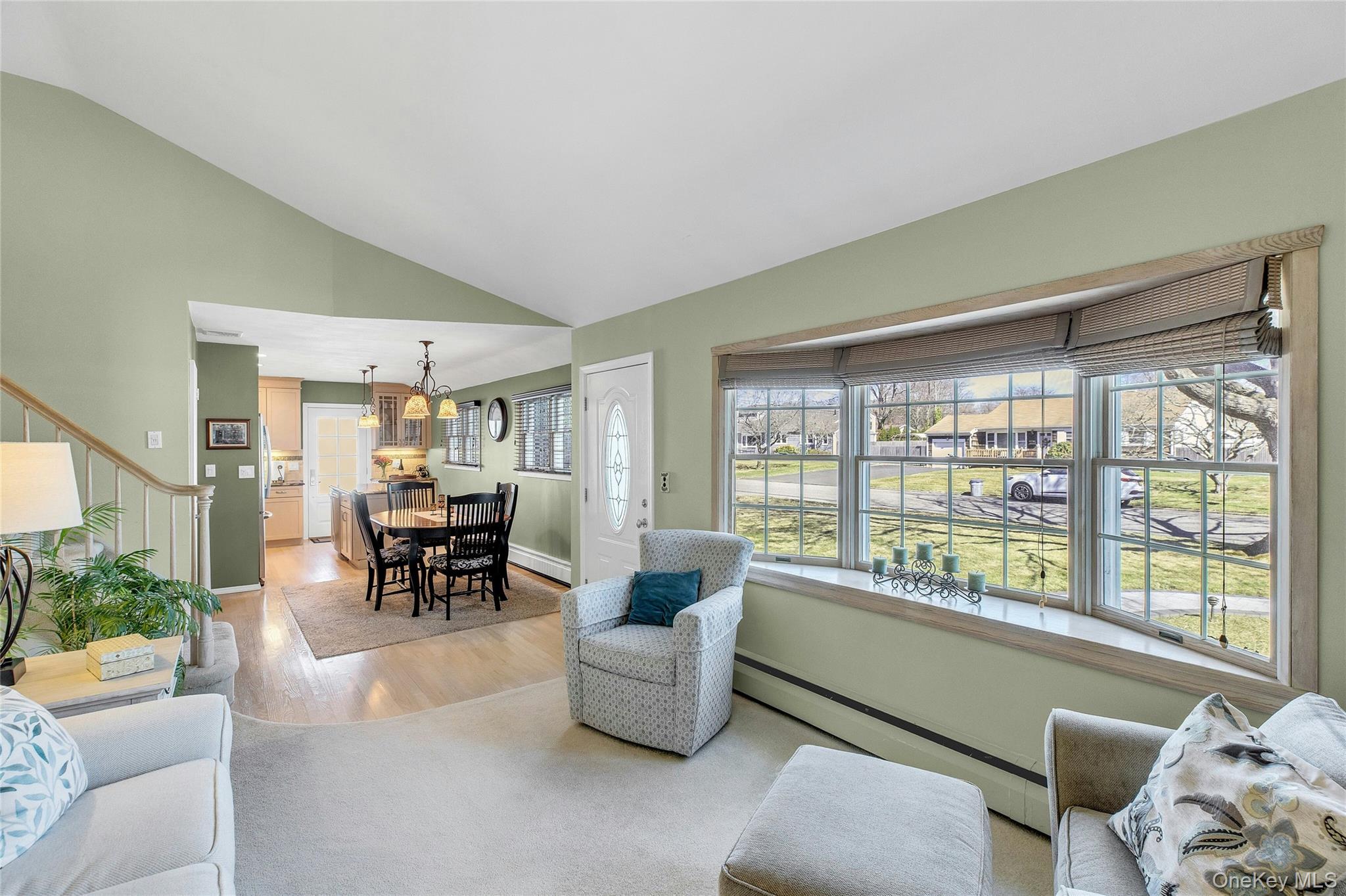 114 Lowell Road Sayville, NY 11782 - Photo 5 of 20 a living room with furniture and a large window