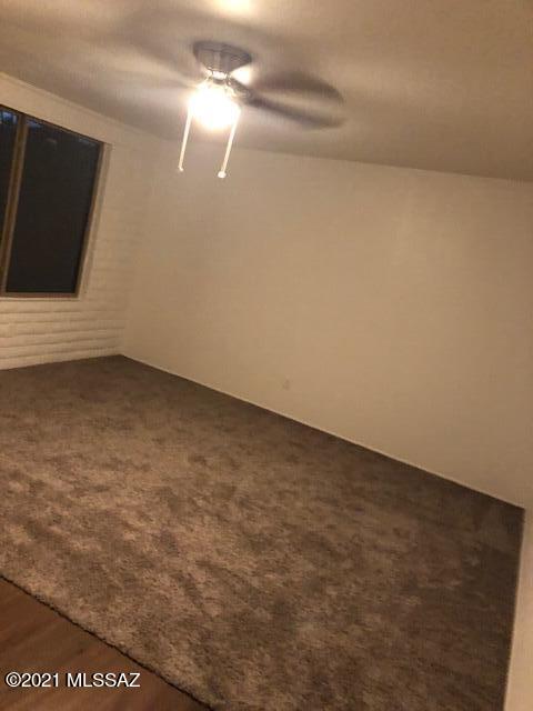 2961 South Lands End Road Tucson, AZ 85713 - Photo 4 of 30 a view of an empty room with a fireplace