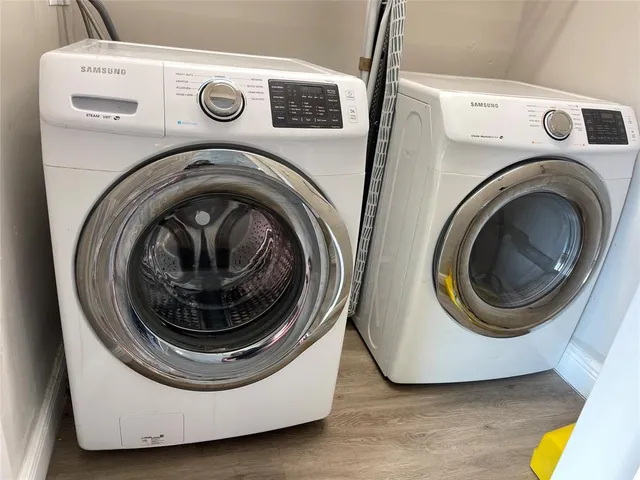 a utility room with dryer and washer