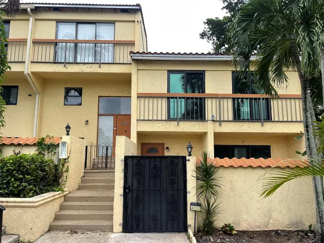a front view of a house with a porch