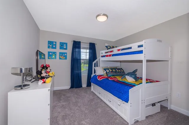 a view of play room with gym equipment