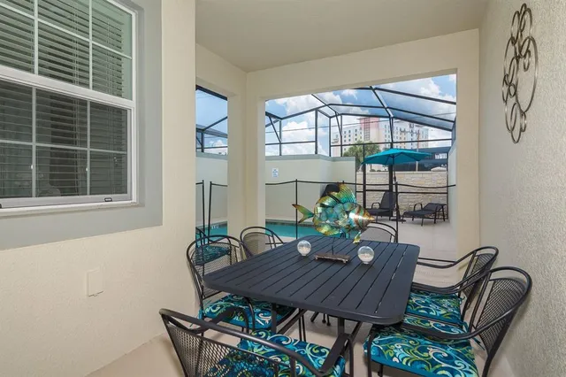 a view of a dining room with furniture window and outside view