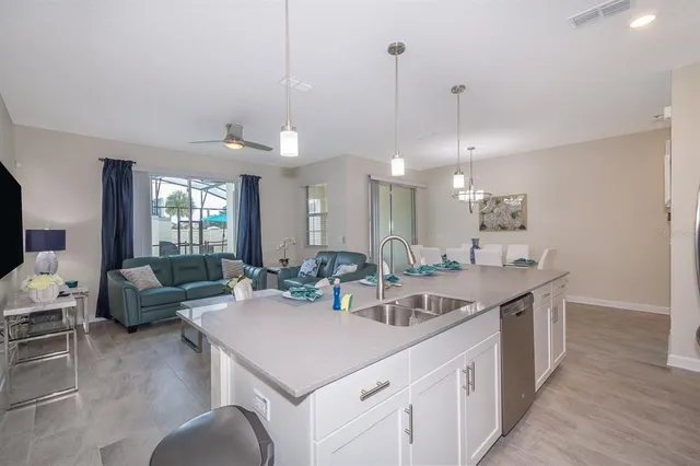 a view of a kitchen island kitchen island furniture and wooden floor