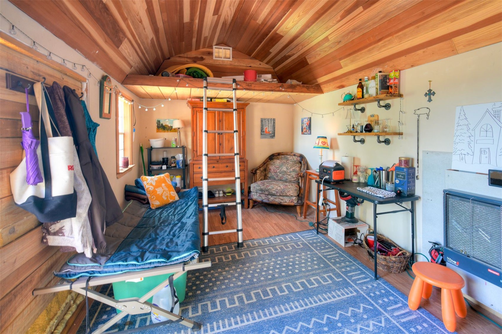 1148 Redhill Road Fairplay, CO 80440 - Photo 12 of 28 The off-grid camper cabin has a sleeping platform and offers a few basic comforts of home.