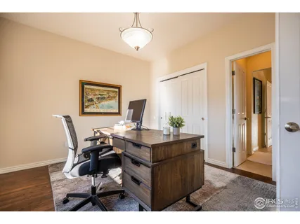 a view of a workspace with furniture