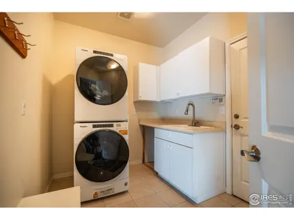 a bathroom with a toilet sink and vanity