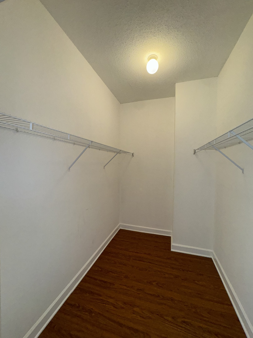 41 East 8th Street, Unit 1702 Chicago, IL 60605 - Photo 12 of 20 a view of a room with wooden floor