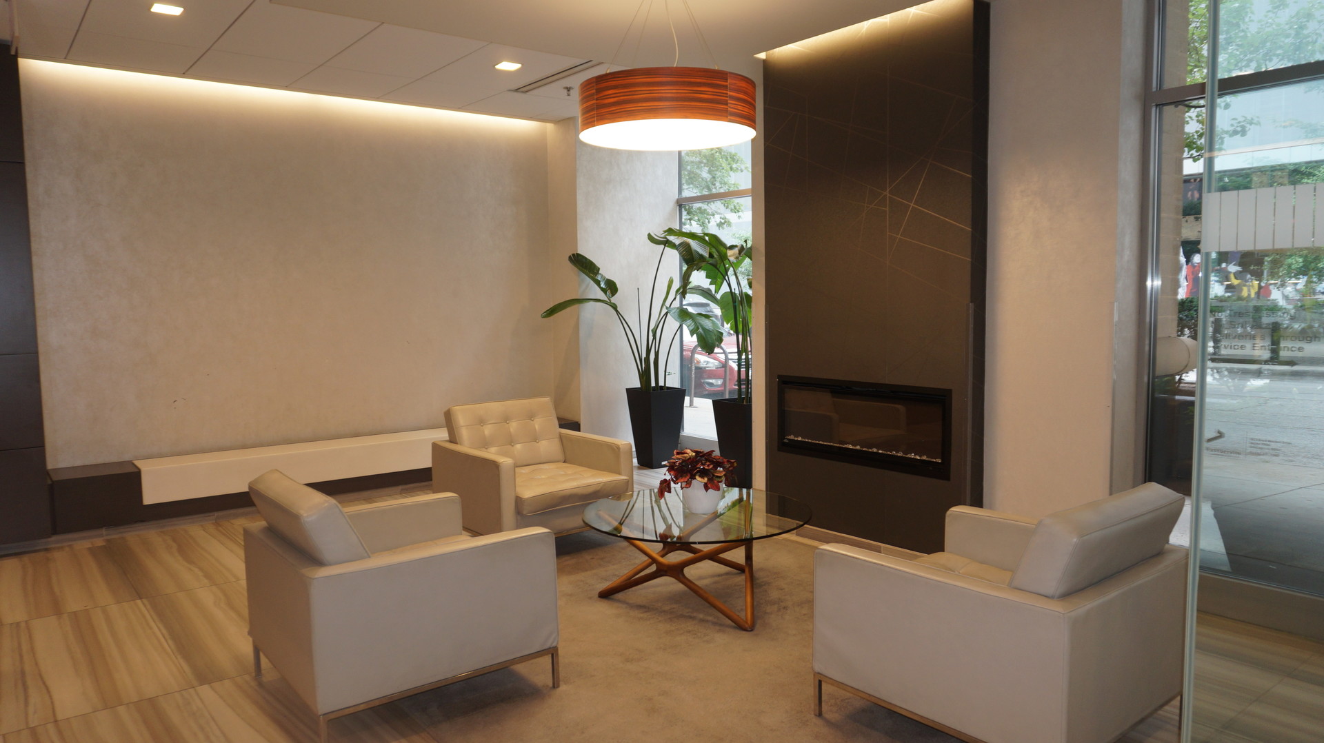 41 East 8th Street, Unit 1702 Chicago, IL 60605 - Photo 2 of 20 a living room with furniture and a fireplace