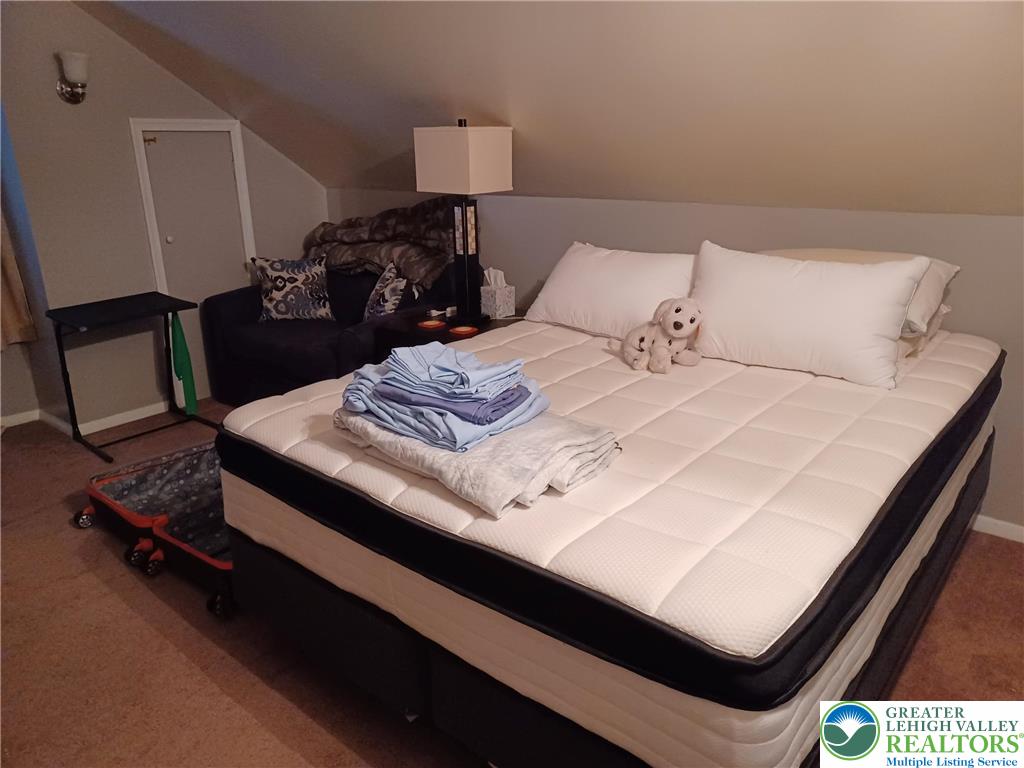 2543 South Law Street Allentown, PA 18103 - Photo 11 of 17 a bedroom with a bed and dresser
