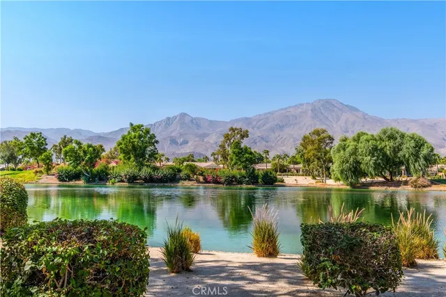 a view of a lake with a mountain in the background