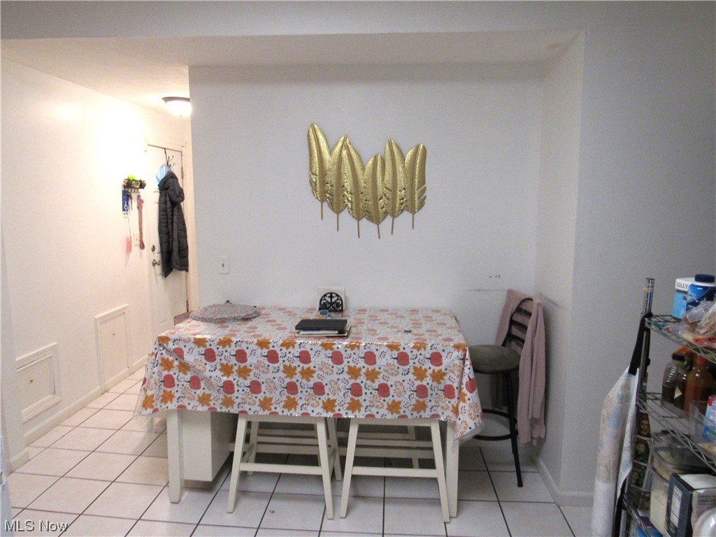 6311 Ridge Road Parma, OH 44129 - Photo 18 of 26 Dining area featuring light tile floors