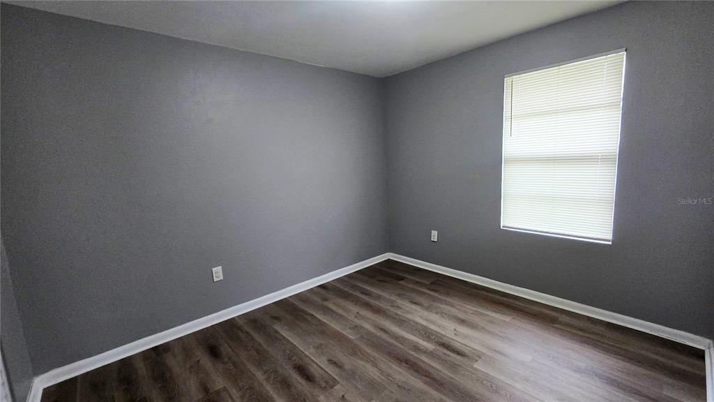 3410 15th Street Southwest Lehigh Acres, FL 33976 - Photo 12 of 31 a room