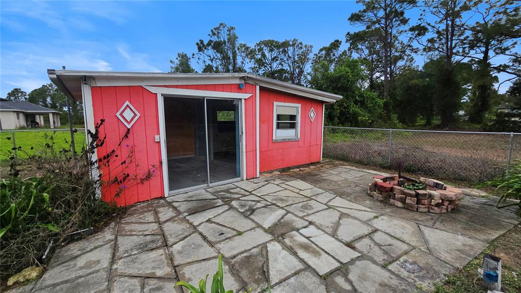 3410 15th Street Southwest Lehigh Acres, FL 33976 - Photo 20 of 31 a front view of a house with entryway