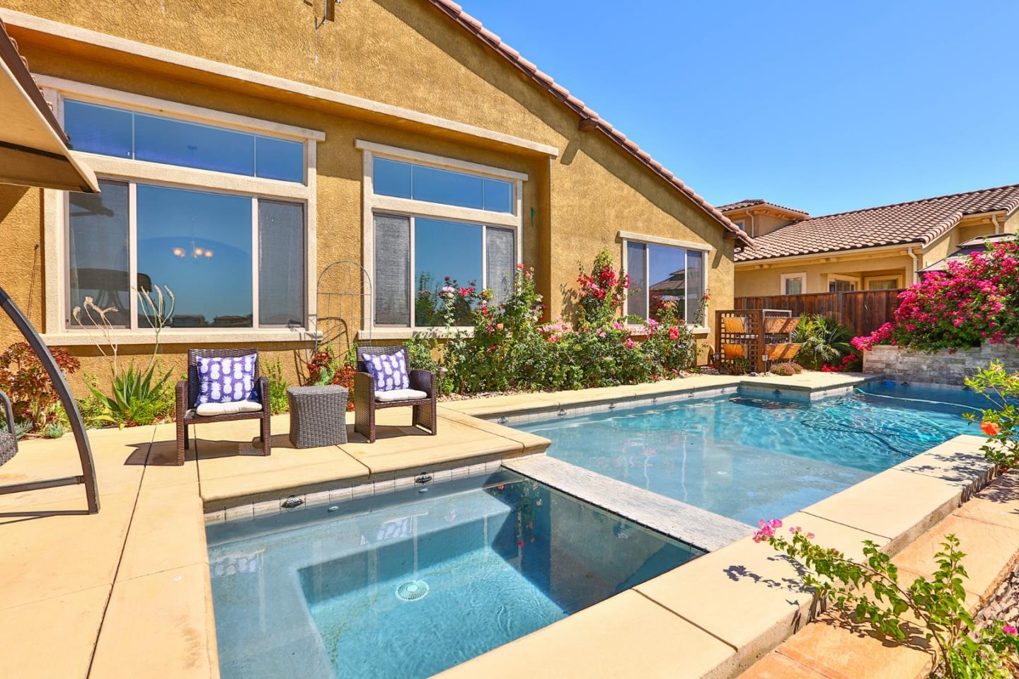 4192 Chiavari Way Manteca, CA 95337 - Photo 18 of 67 a view of swimming pool with outdoor seating
