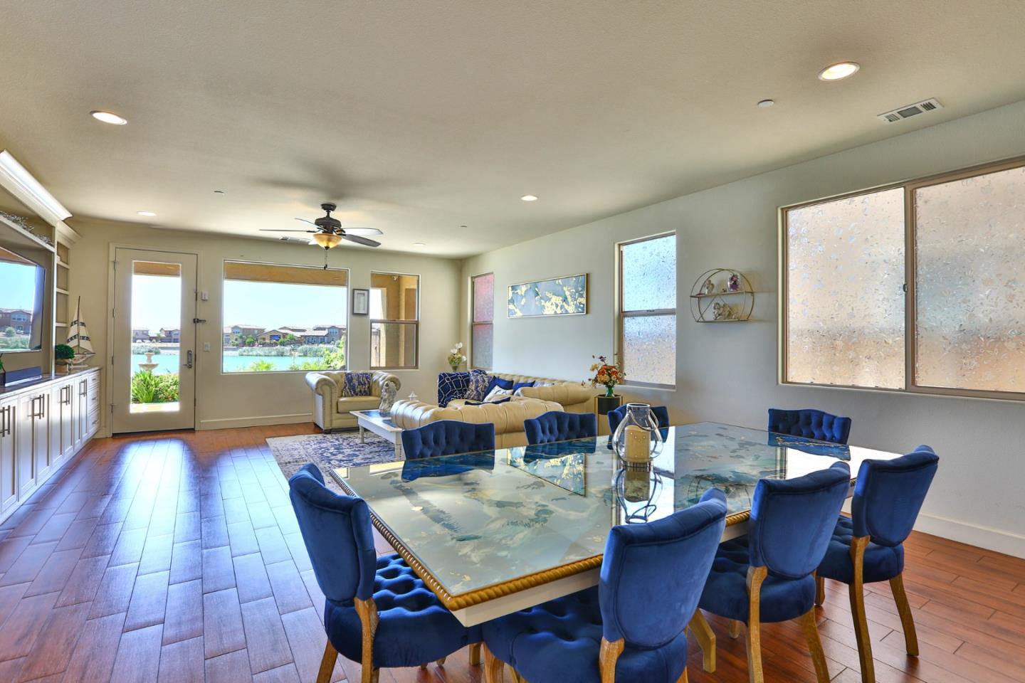 4192 Chiavari Way Manteca, CA 95337 - Photo 30 of 67 a view of a dining room with furniture window and wooden floor