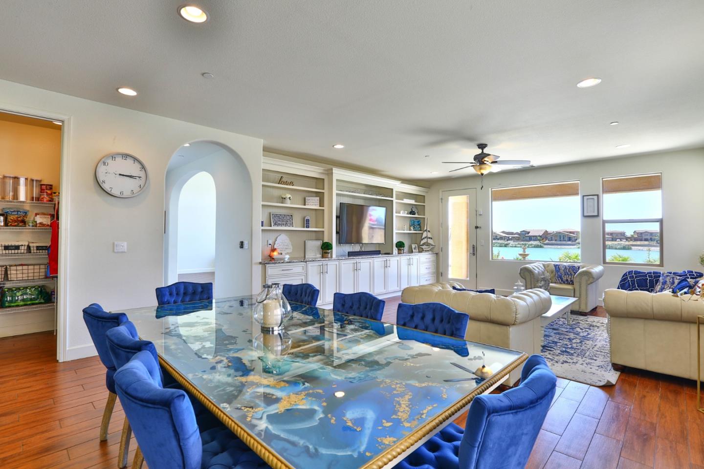 4192 Chiavari Way Manteca, CA 95337 - Photo 31 of 67 a view of a dining room with furniture window and wooden floor