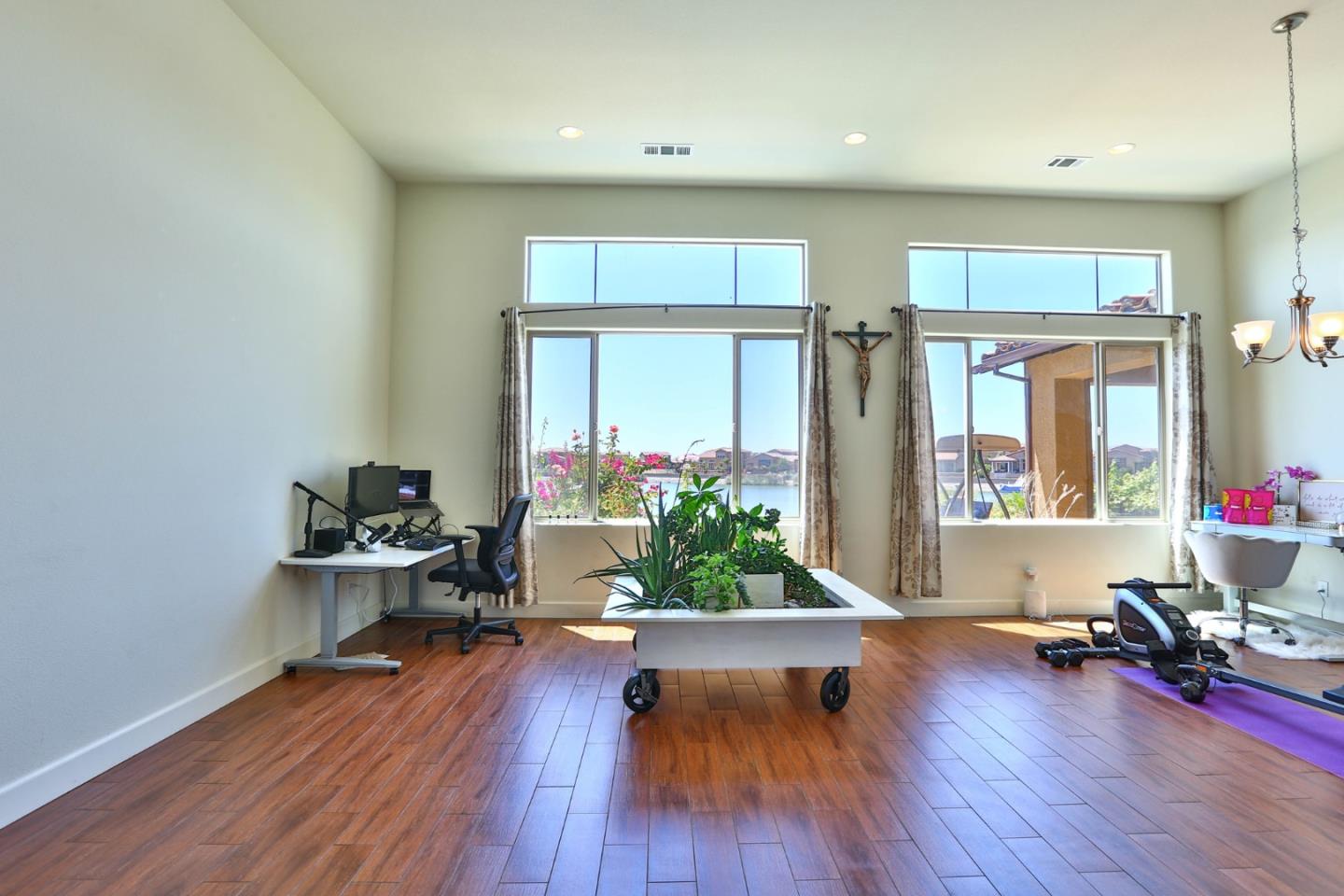 4192 Chiavari Way Manteca, CA 95337 - Photo 36 of 67 a living room with furniture and a large window