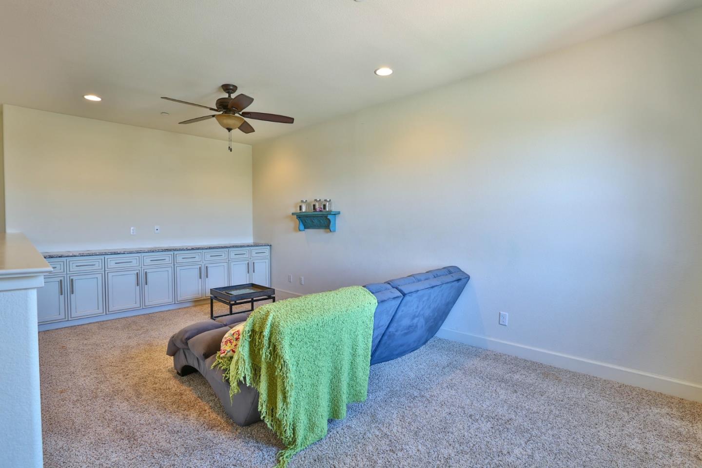4192 Chiavari Way Manteca, CA 95337 - Photo 46 of 67 a view of a room with furniture and a ceiling fan