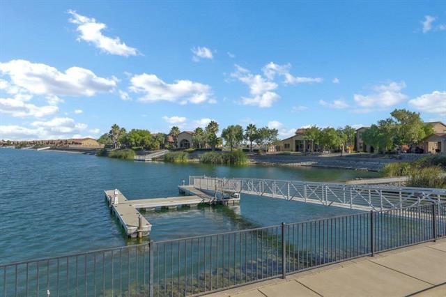 4192 Chiavari Way Manteca, CA 95337 - Photo 65 of 67 a view of a lake with a terrace from a lake view