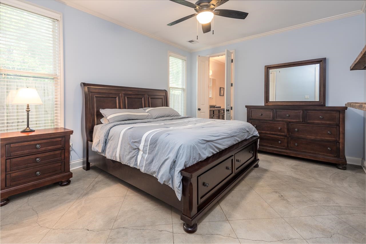 585 Alexander Street Memphis, TN 38111 - Photo 15 of 30 a bedroom with a bed and a dresser