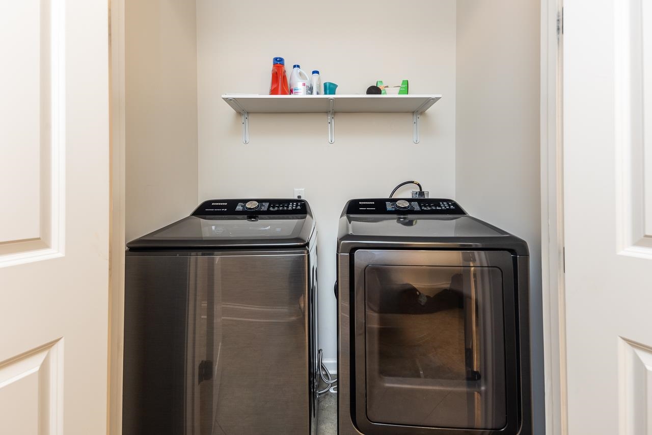 585 Alexander Street Memphis, TN 38111 - Photo 21 of 30 a utility room with dryer and washer