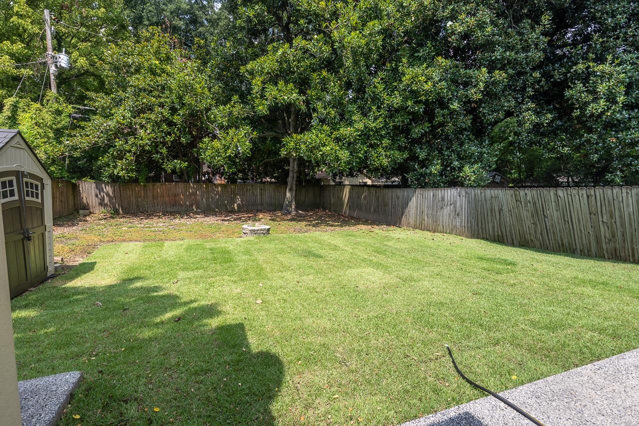 585 Alexander Street Memphis, TN 38111 - Photo 22 of 30 a swimming pool with wooden fence