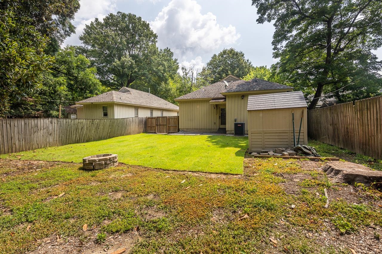 585 Alexander Street Memphis, TN 38111 - Photo 25 of 30 a view of a house with a yard