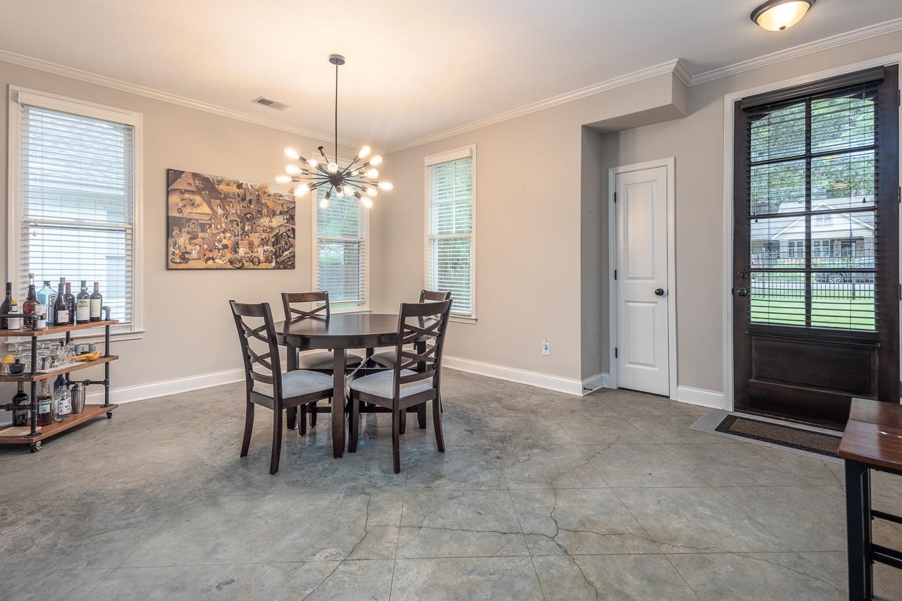 585 Alexander Street Memphis, TN 38111 - Photo 5 of 30 a view of a dining room with furniture and window