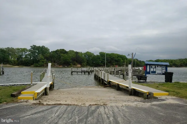 a view of a lake with a sitting area