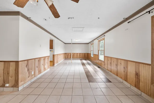 a view of an empty room and window