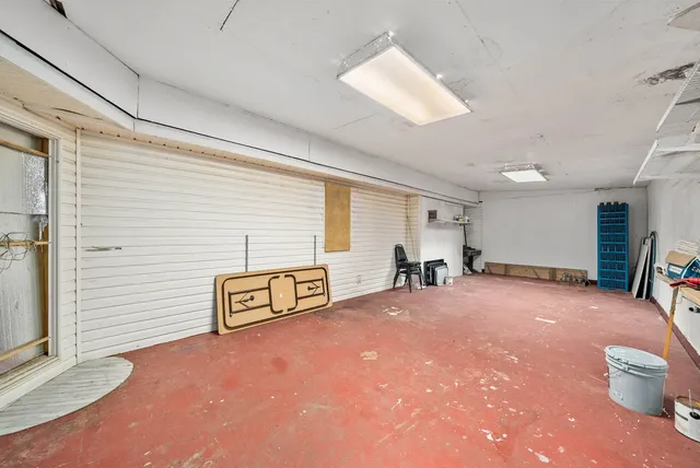 a bathroom with a toilet and a bathtub