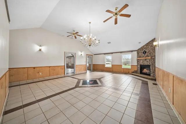 a view of living room with furniture and flat screen tv