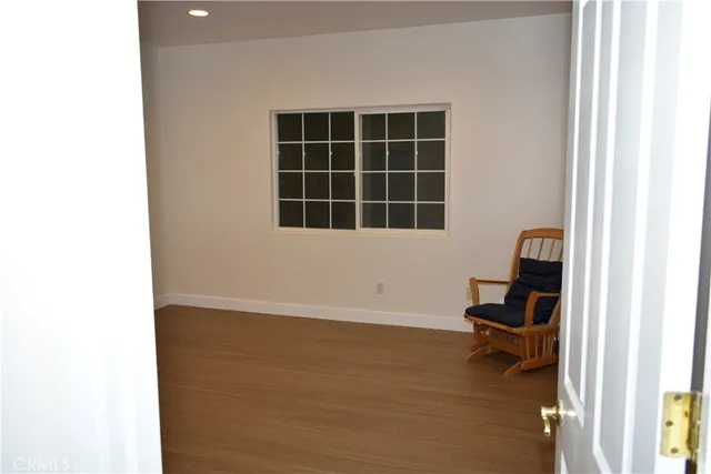 a kitchen with stainless steel appliances granite countertop a refrigerator and a stove