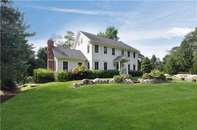 6 Oxbow Road Westport, CT 06880 - Photo 1 of 1 a front view of a house with a yard