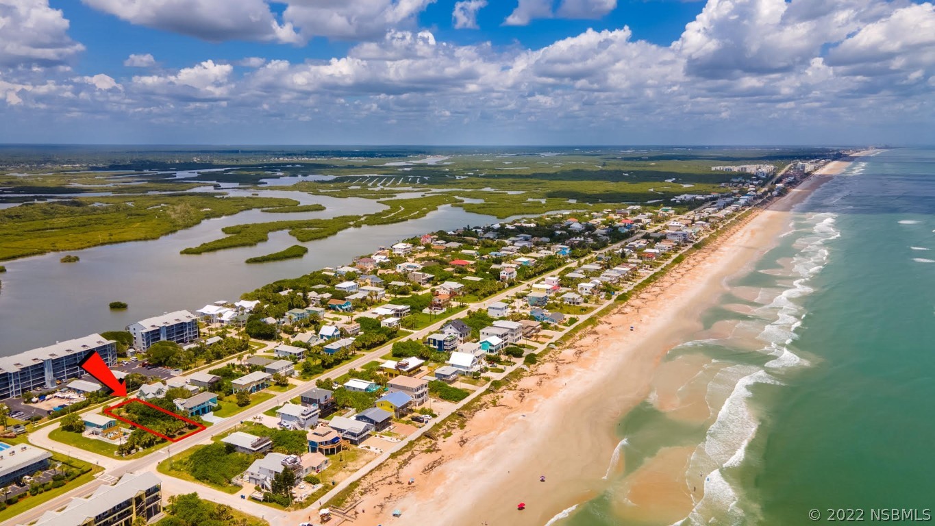 0 Engram Road New Smyrna Beach, FL 32169 - Photo 5 of 6 a view of an ocean and beach