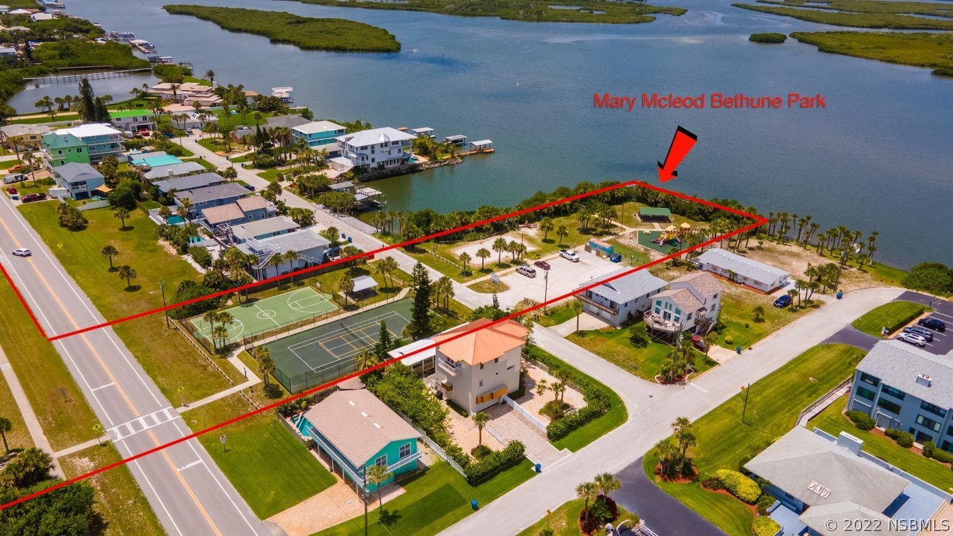 0 Engram Road New Smyrna Beach, FL 32169 - Photo 6 of 6 an aerial view of a houses with yard