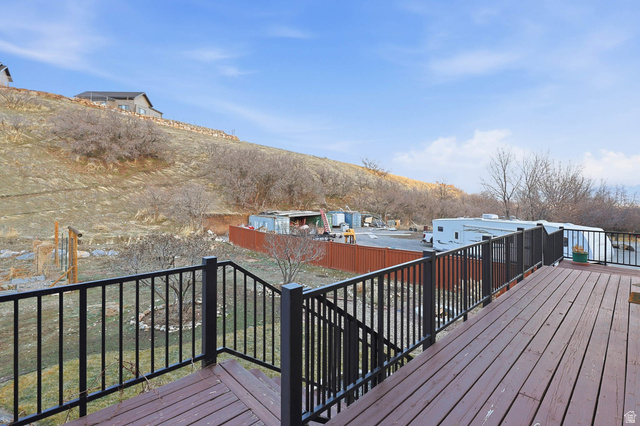 605 North Loafer Canyon Road Elk Ridge, UT 84651 - Photo 53 of 53 Deck with a mountain view