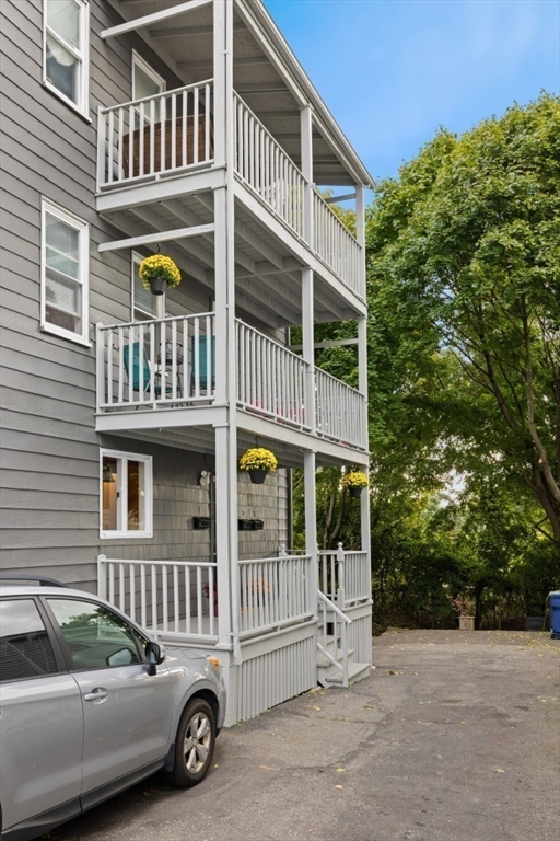 49 Lawrence Street, Unit 2 Salem, MA 01970 - Photo 7 of 13 a view of a car park in front of a building