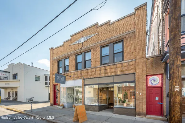 a front view of a building with street