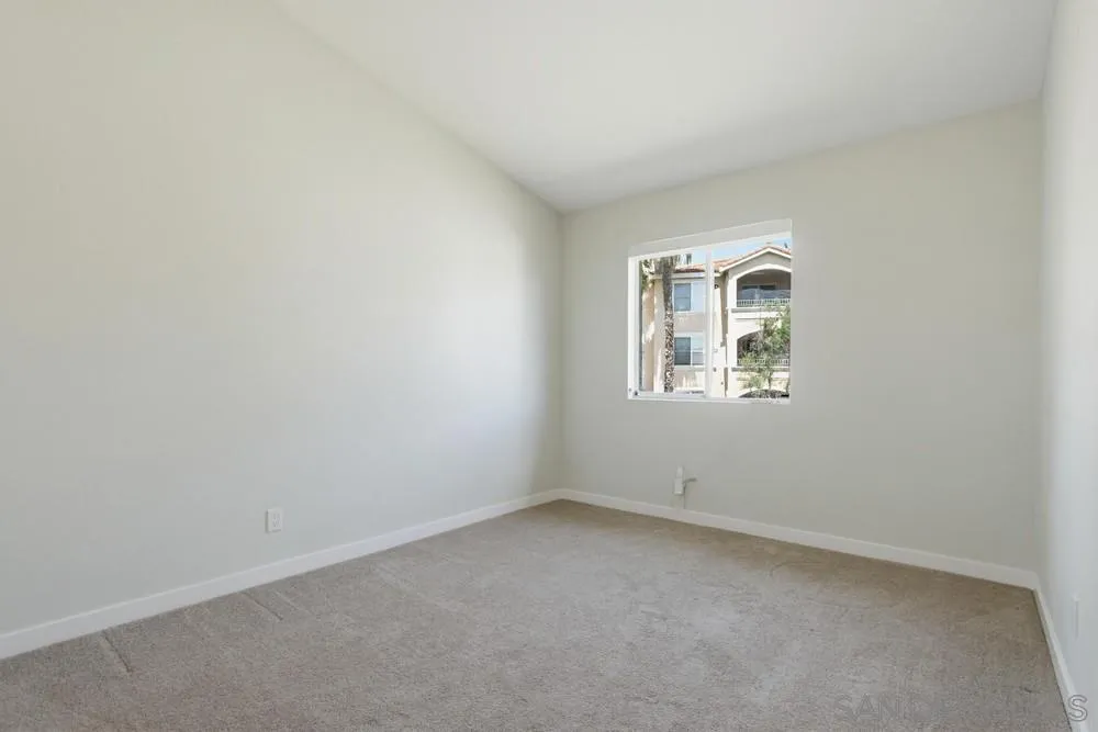 5130 North River Road, Unit B Oceanside, CA 92057 - Photo 35 of 51 an empty room with windows