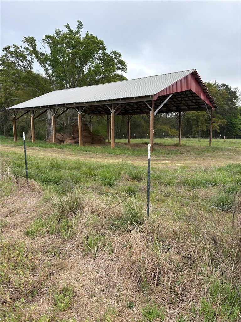 Lot 3 Joyo Road Iva, SC 29655 - Photo 2 of 2 This expansive agricultural structure offers ample covered space for various farming needs.