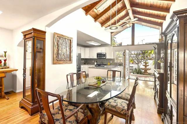 a view of a dining room with furniture and a table