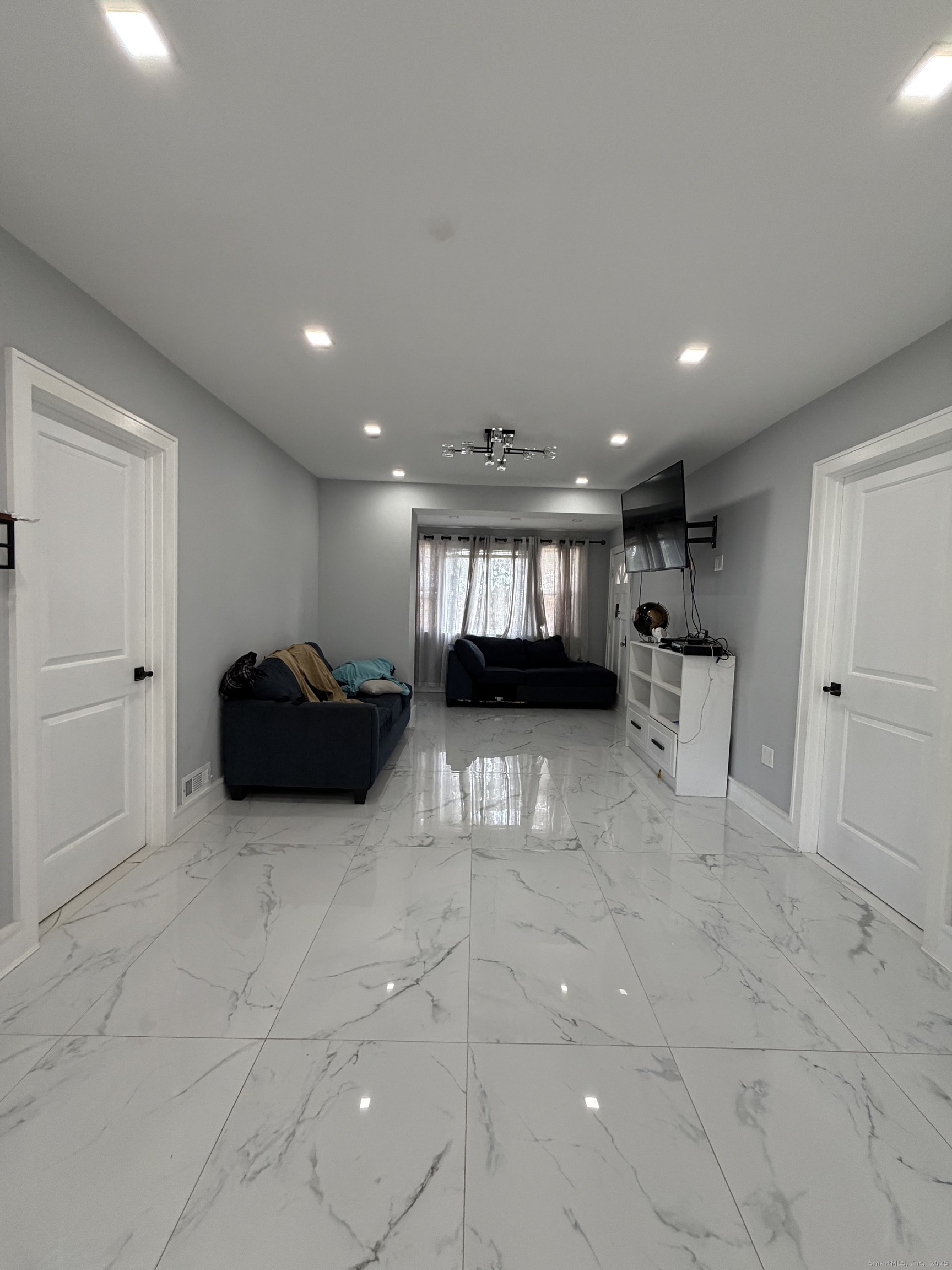 2964 State Street, Unit 1 Hamden, CT 06517 - Photo 6 of 18 a view of kitchen with stainless steel appliances refrigerator and microwave