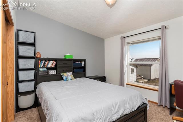 7935 Mohawk Road Colorado Springs, CO 80908 - Photo 11 of 33 Secondary Bedroom on Main Level.