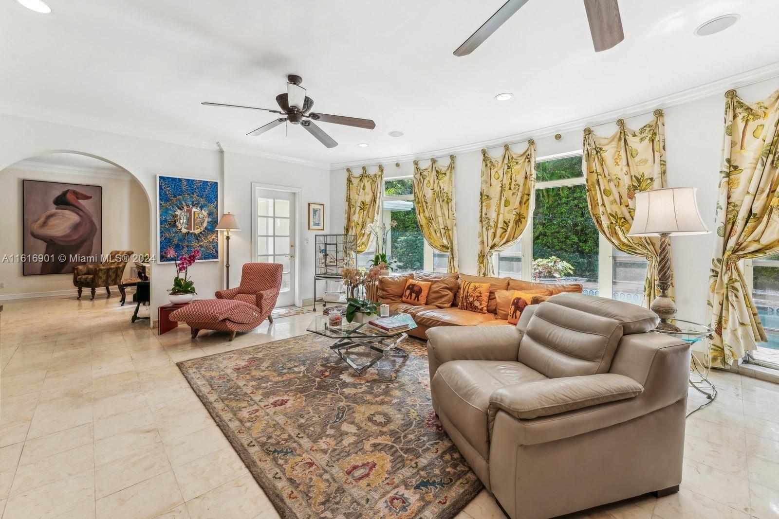 4430 Sabal Palm Road Miami, FL 33137 - Photo 8 of 38 a living room with furniture and a large window