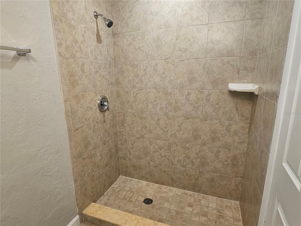 7000 Brentford Road Sarasota, FL 34241 - Photo 24 of 29 a bathroom with a shower