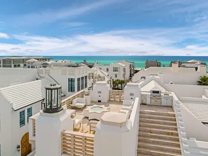a view of a city with an ocean view